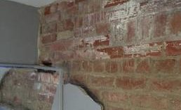 Plaster on Brick Before